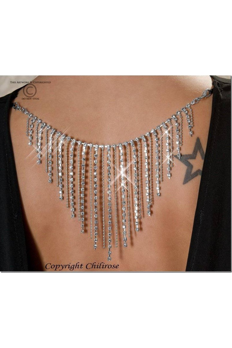 Sexy mini abito con schiena scoperta e gioiello