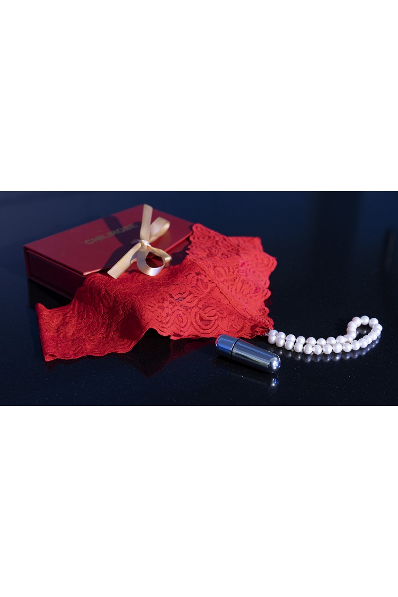 Perizoma rosso con perle naturali e gadget erotico